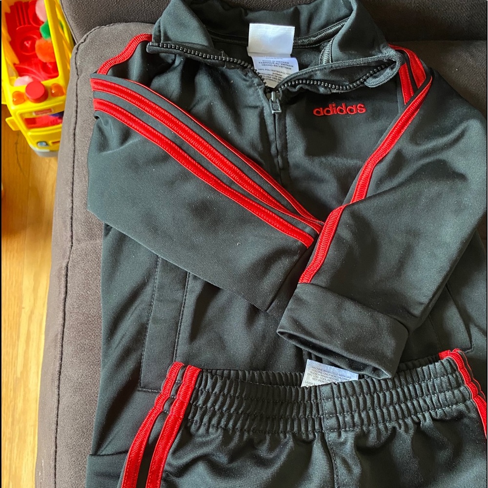 Adidas outfit in red.